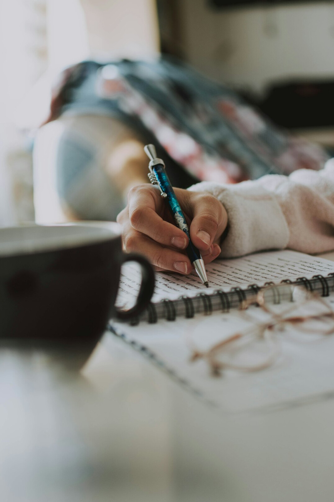 person journaling about feelings